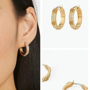 Tory Burch's sophisticated, fashionable, and versatile diamond hoop earrings